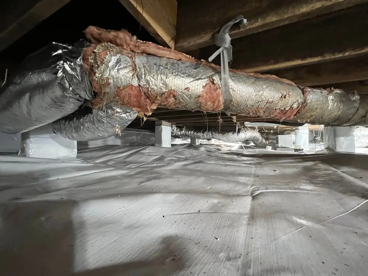 Full crawl space encapsulation with sealed vapor barrier