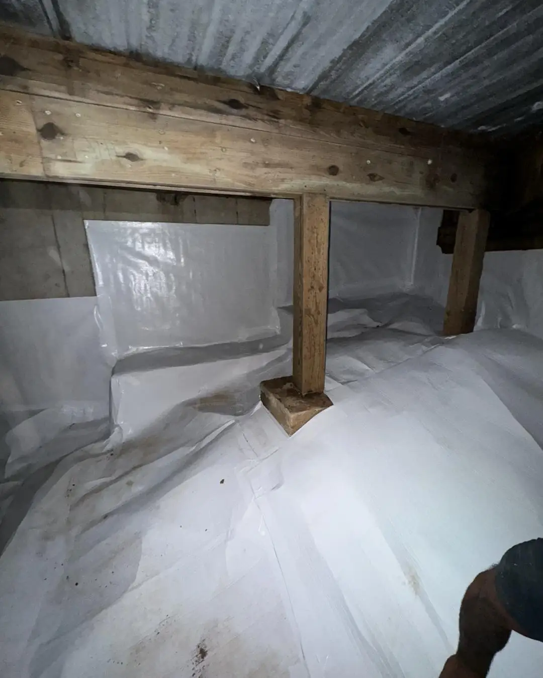 Vapor barrier sealed around a support post