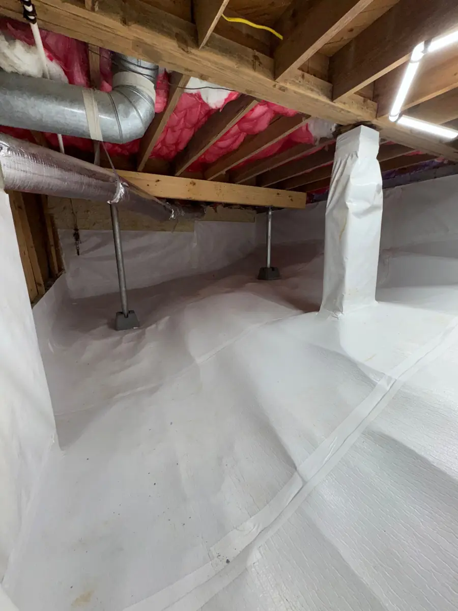 Steel support jacks under a sagging floor
