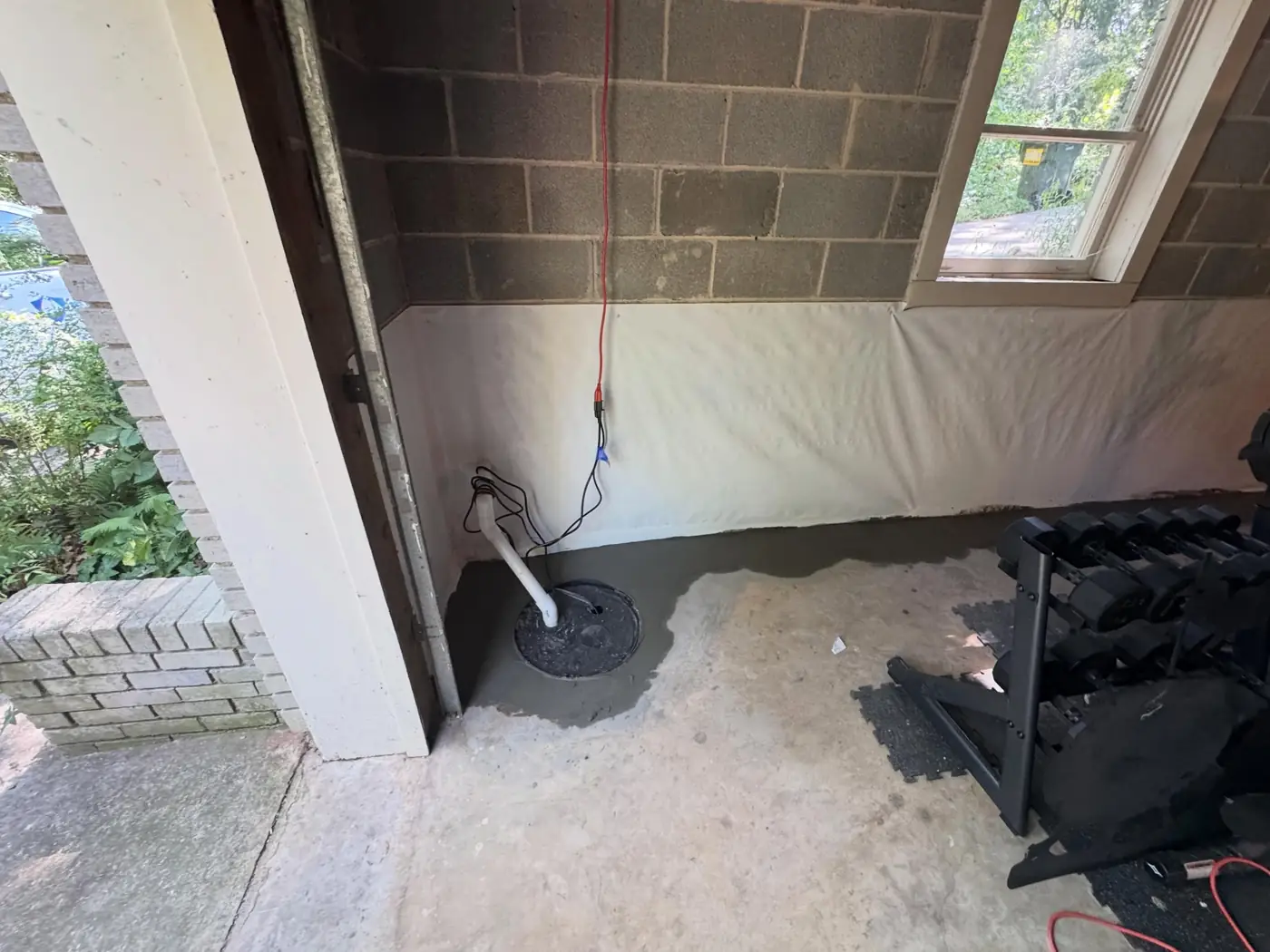 Basement sump pump and drainage installed by PPS in Woodstock, GA